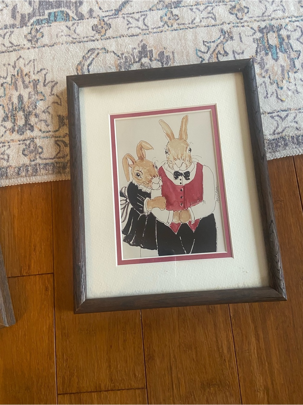 Framed Bunny Illustration in Dark Wood Frame with Red Mat 11”x 7”